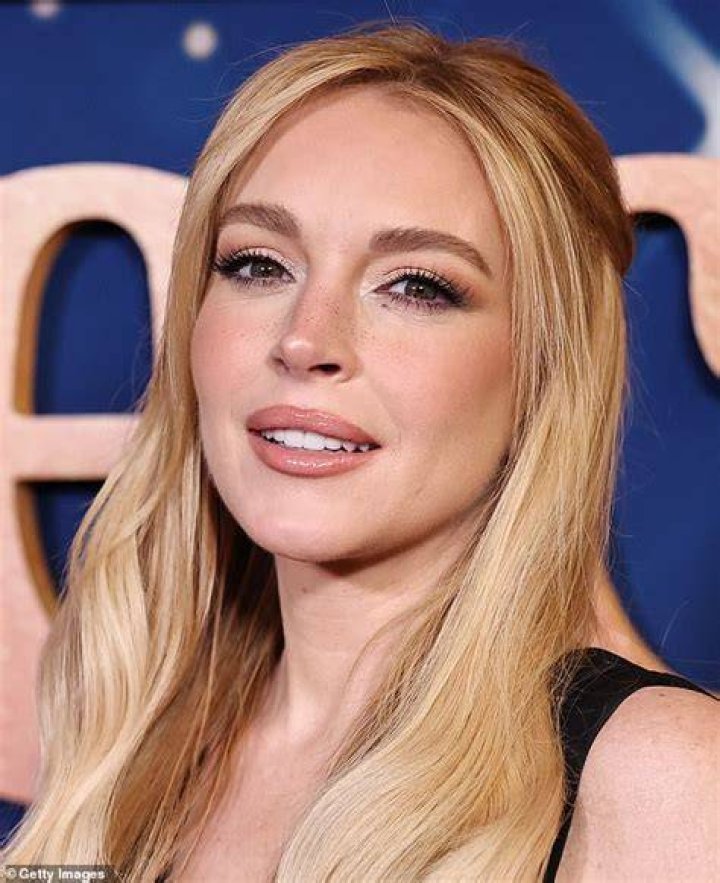 Back to Blonde: Lindsay Lohan emerges from an LA hair salon with newly dyed honey-coloured locks