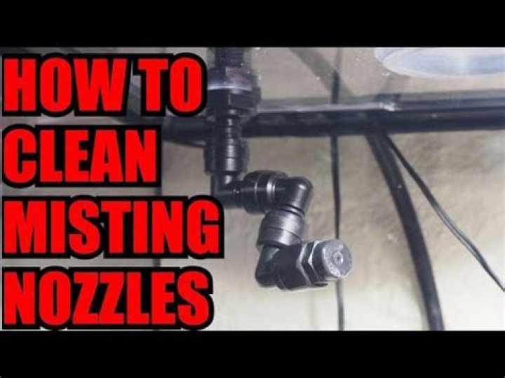 How do you clean misting system nozzles?