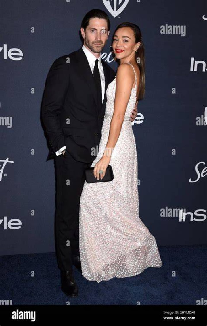 Iddo and Ashley both wears chic suits