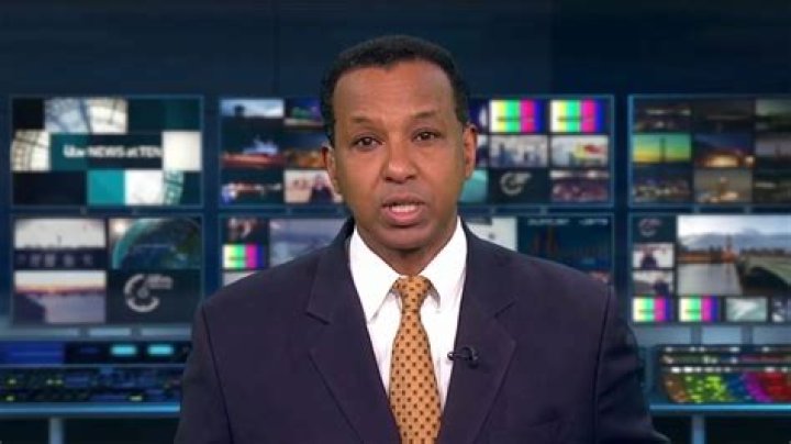 Jonathan while presenting news. Know about his career, profession
