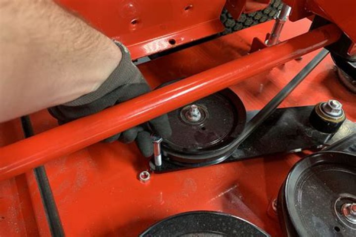 What causes mower belts to break?